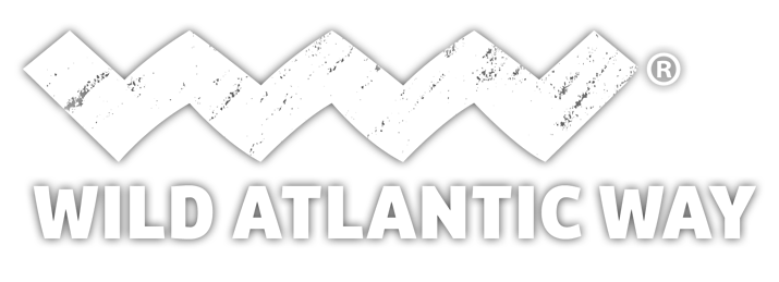 Logo of the Wild Atlantic Way. The design features the words "WILD ATLANTIC WAY" in bold, capital letters below a jagged, wave-like pattern. The pattern and text are enclosed within a rectangular border.